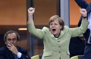 German Chancellor Angela Merkel (R) cele